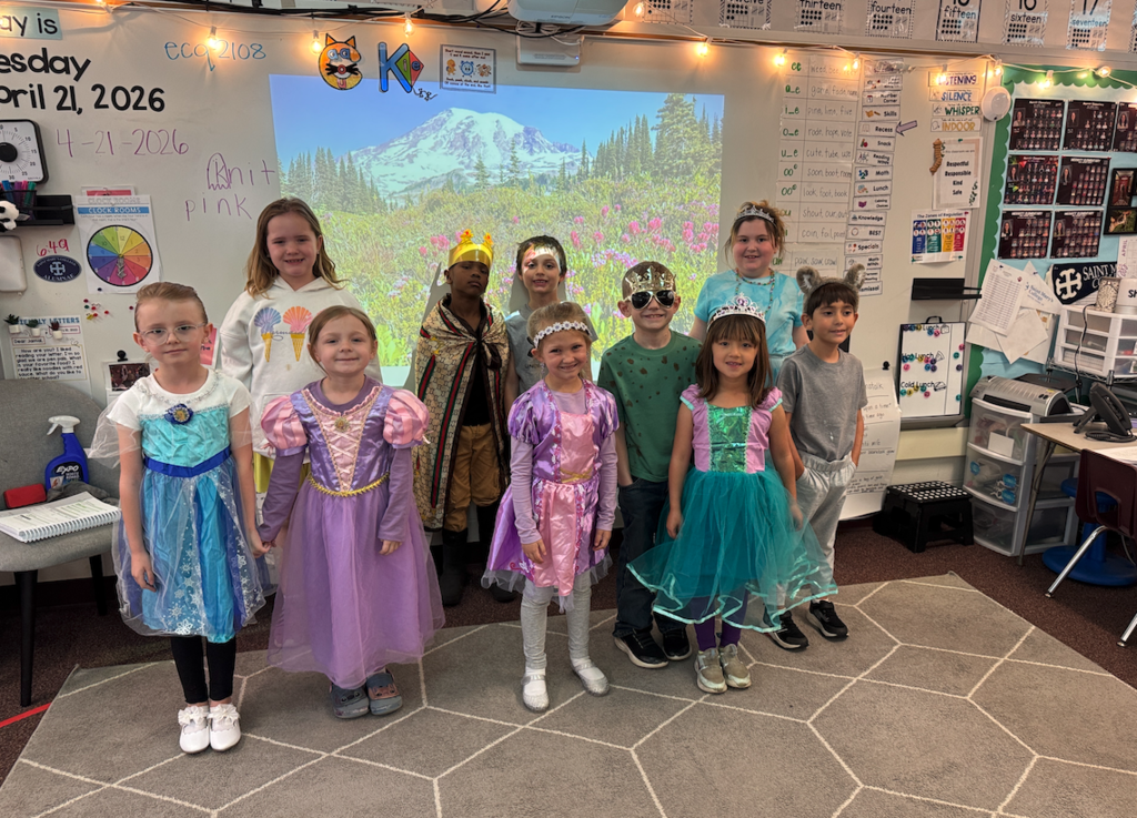 group of first graders dressed up in fairytale costumes