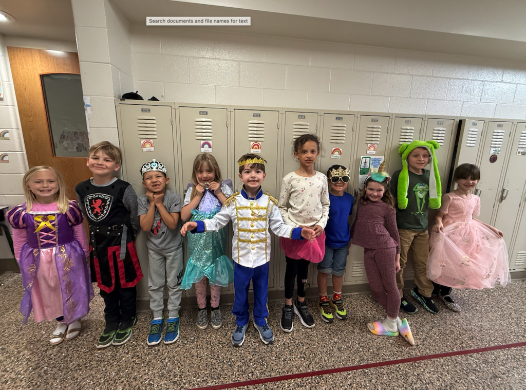 group of first graders dressed up in fairytale costumes