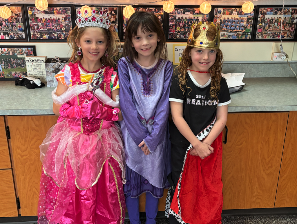 group of first graders dressed up in fairytale costumes