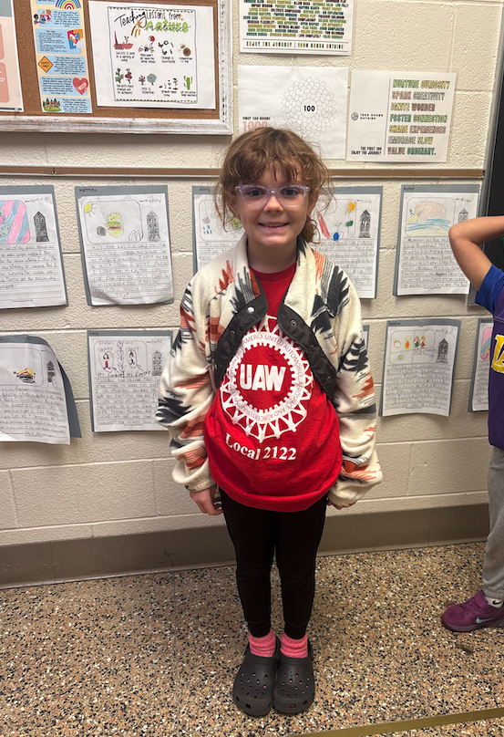 little girl dressed up as union member