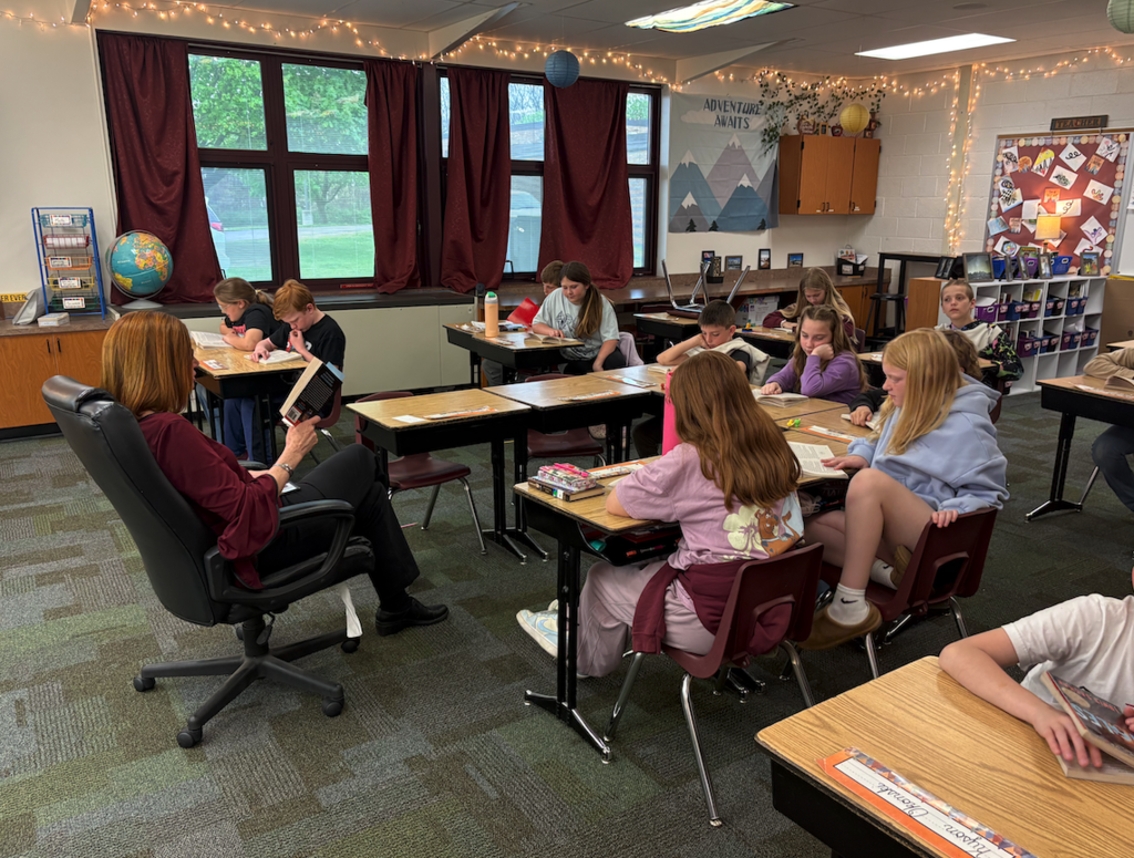 teacher reading to class