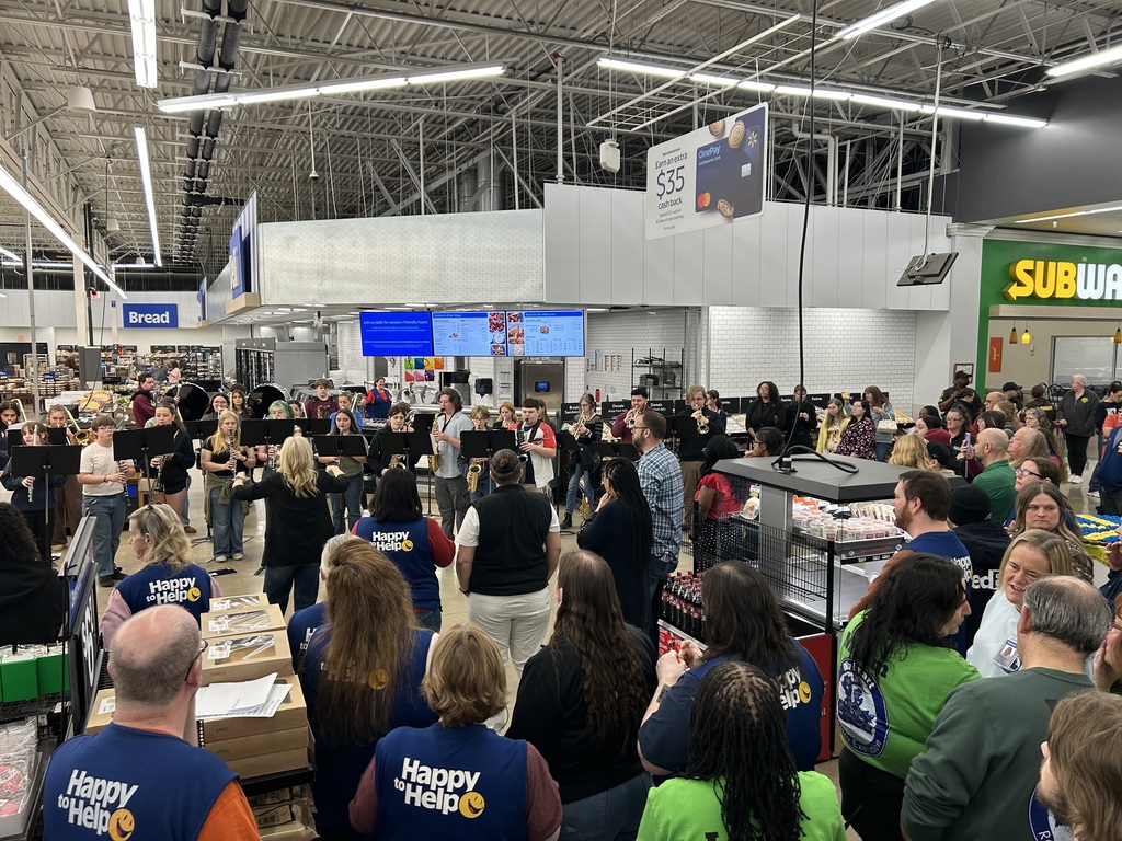 Band playing at Walmart in front of crowd