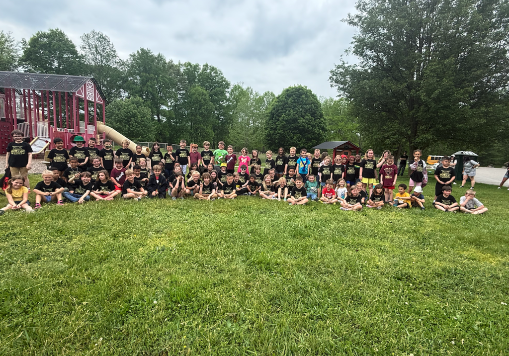 first grade class in front of playground 