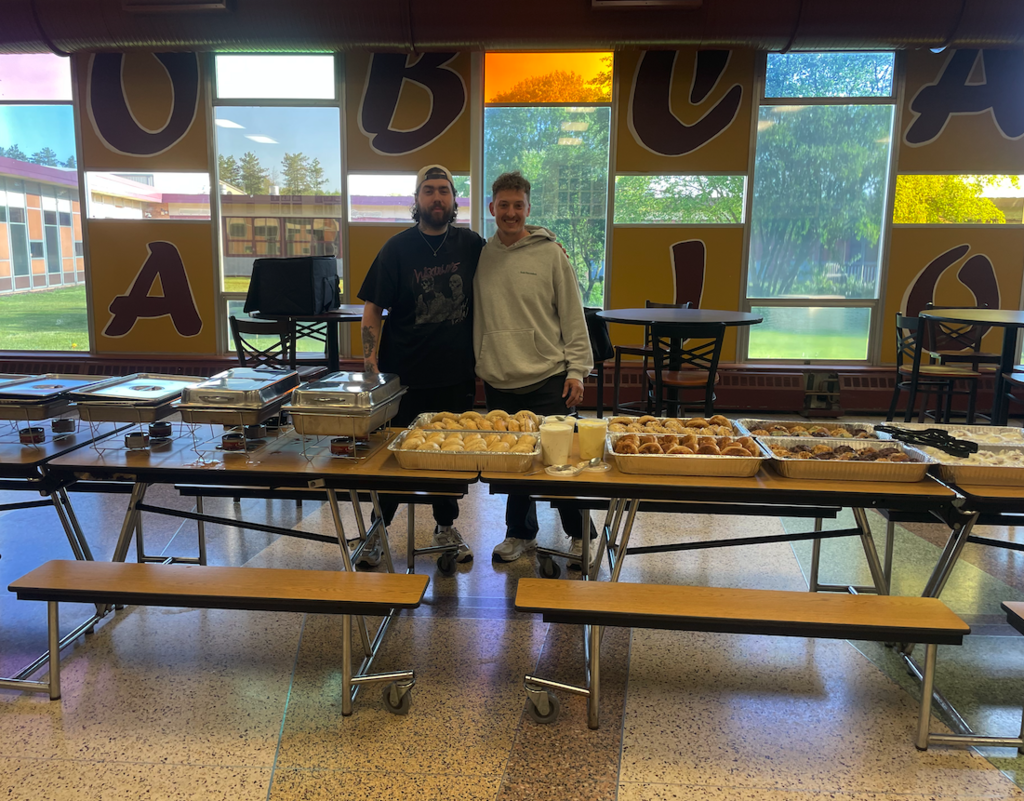 workers from 2nd & Main setting up breakfast