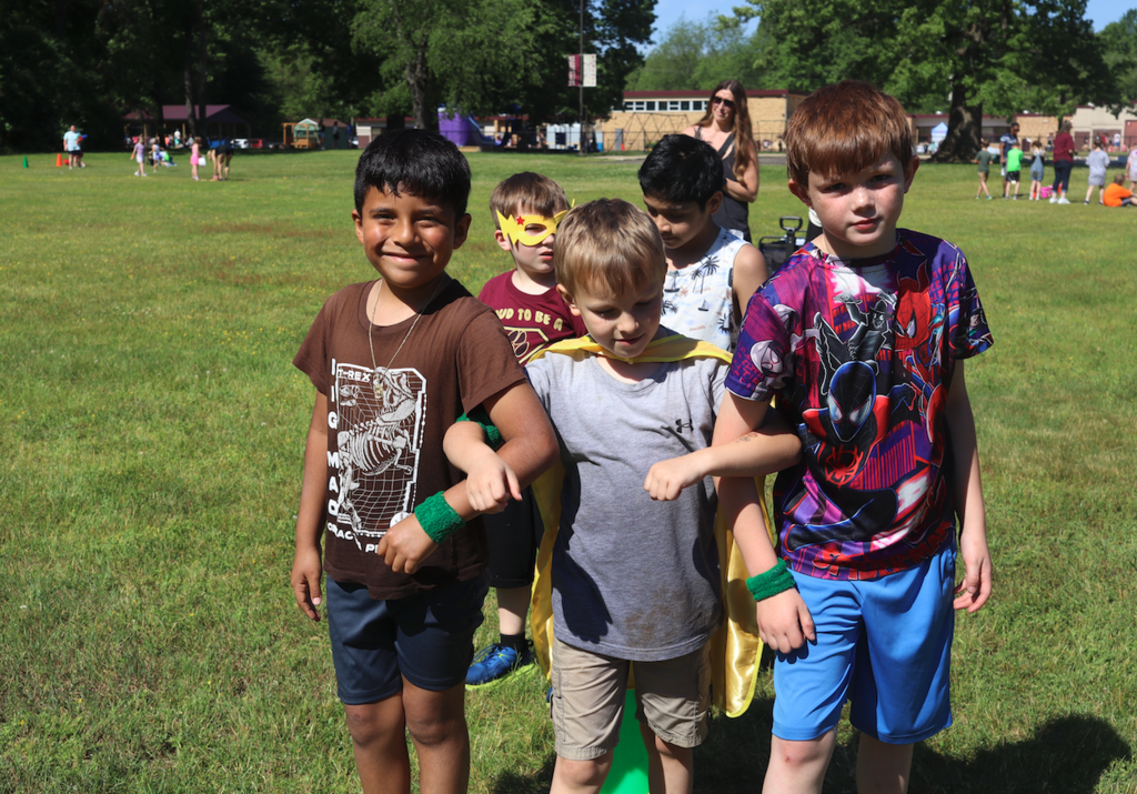 three boys getting ready to run relay races