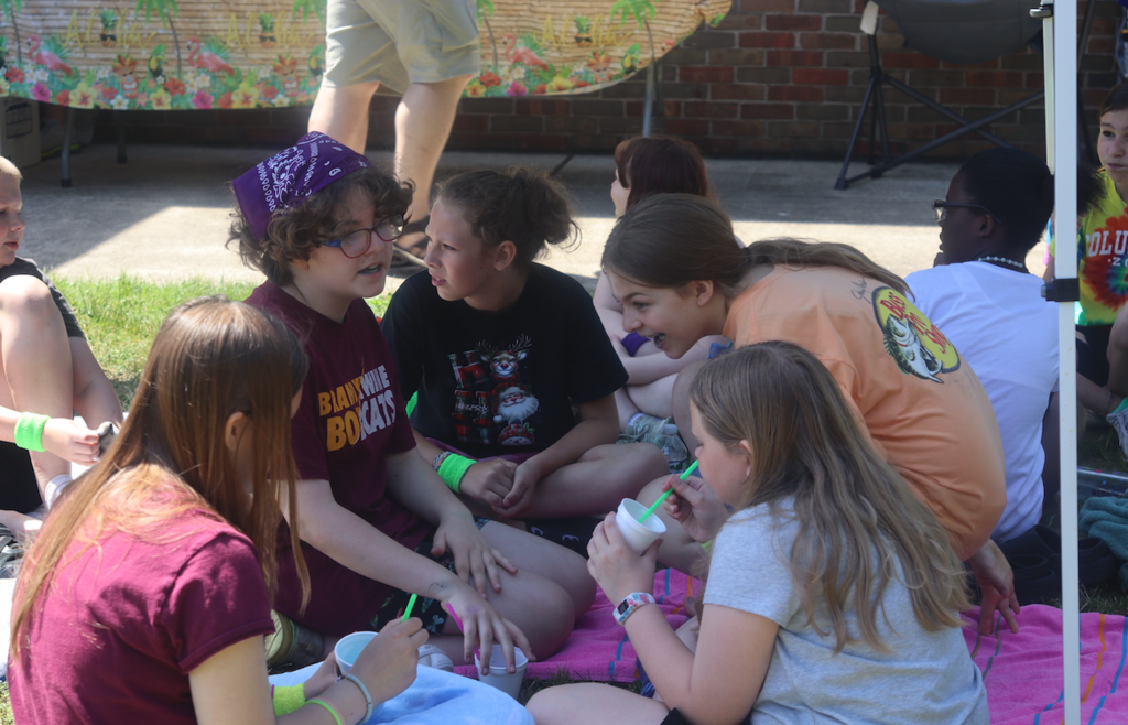 group of girls eating snow cones 