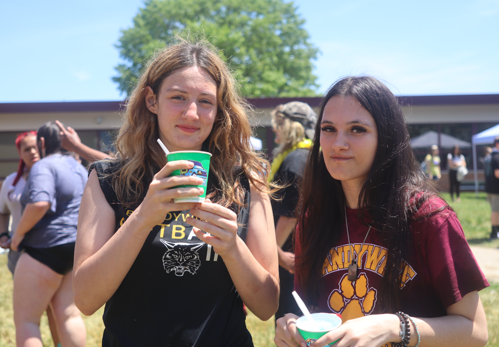two girls eating snow cones