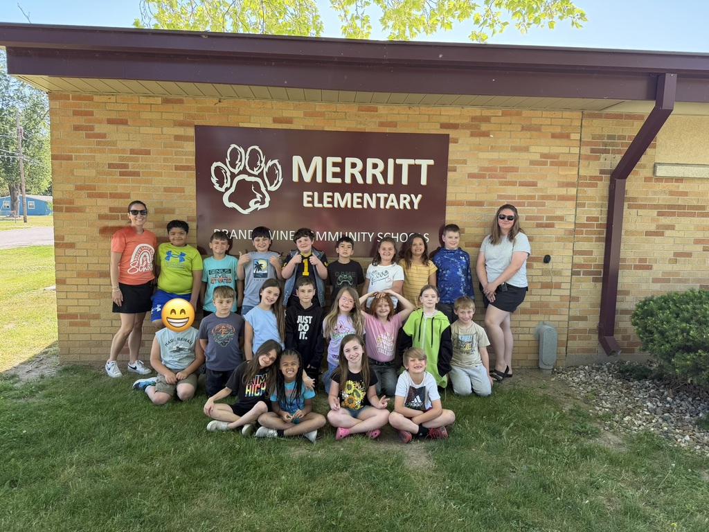 group of students with teachers in front of Merritt elementary