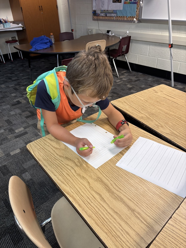 kid working on a worksheet