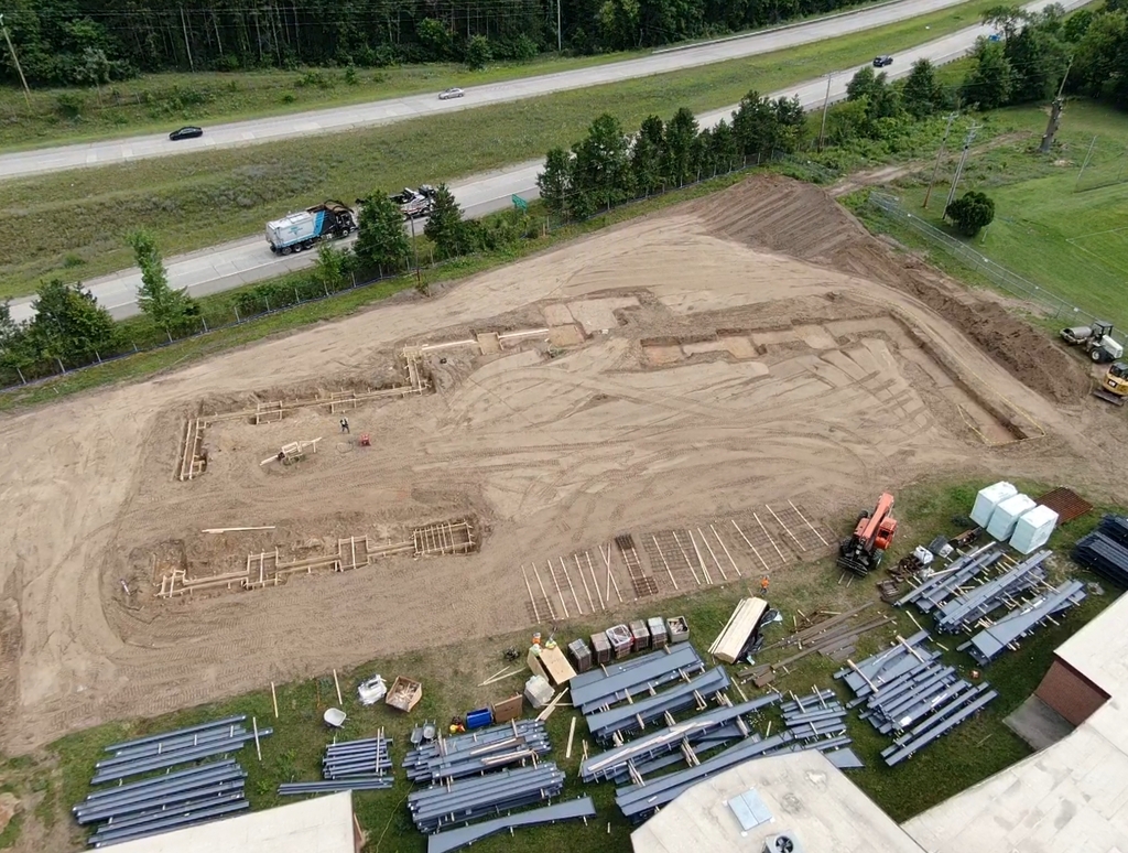 layout of CTE center in dirt on construction site.