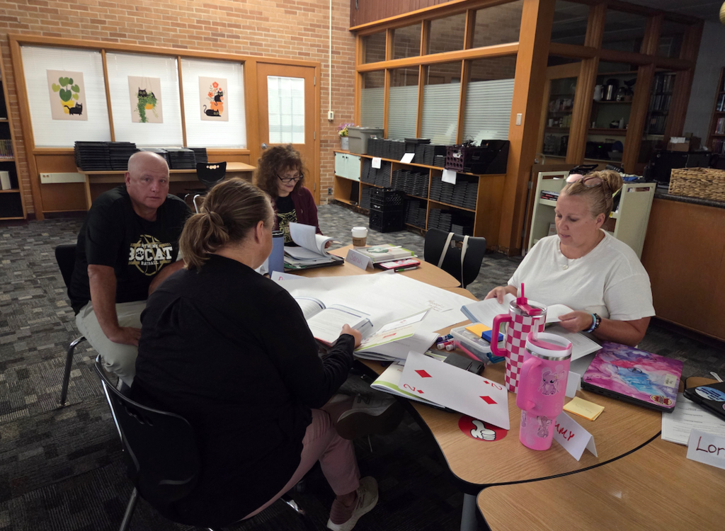 group of teachers discussing