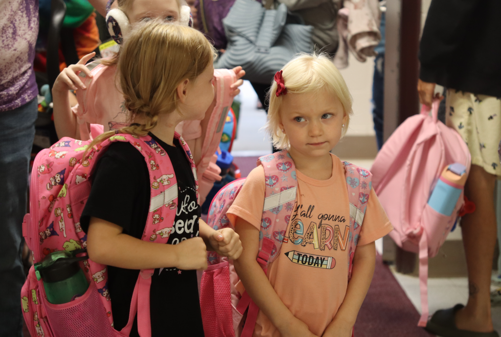 little girls dressed with their backpacks