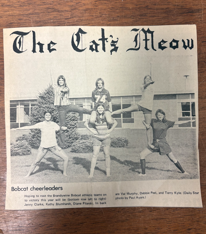 old newspaper clipping of bobcat cheerleader picture, with the cat's meow printed as the headline