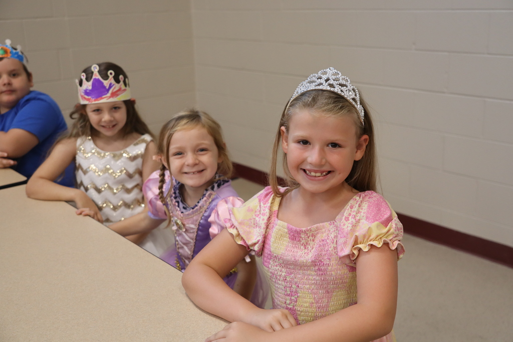 little girls dressed up as princesses