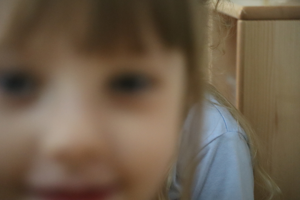 fuzzy photo of a young girl