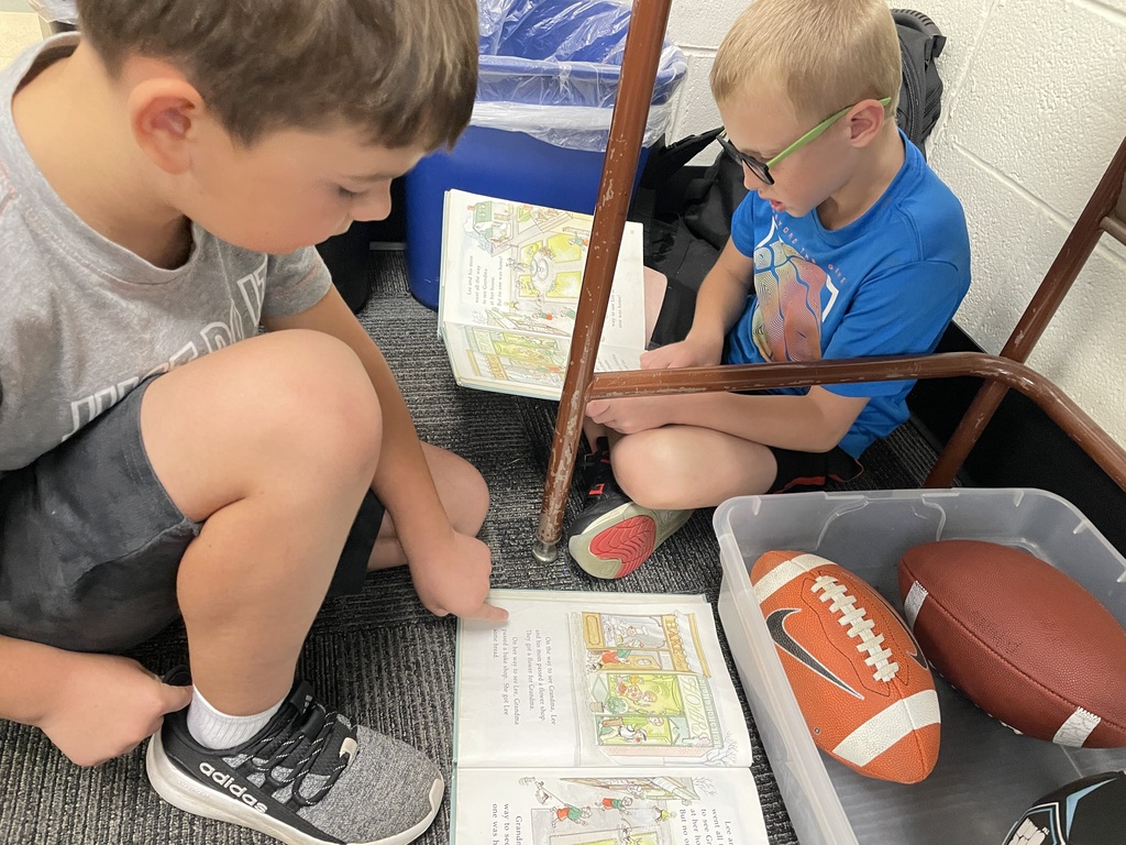 two boys reading