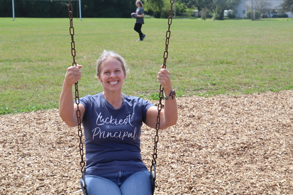 elise sorensen on a swing