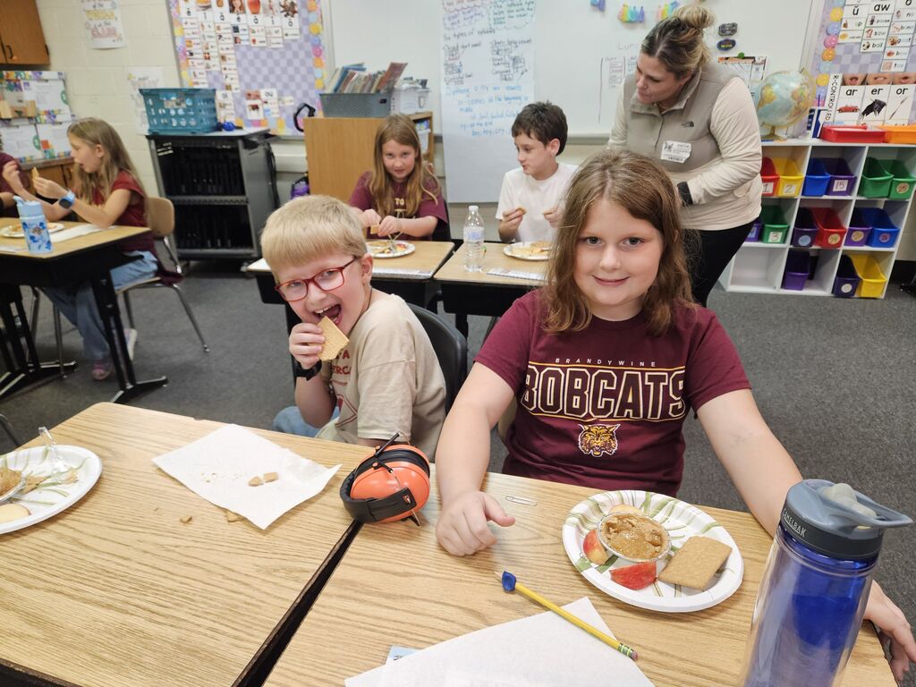 young boy and young girl with apple pie