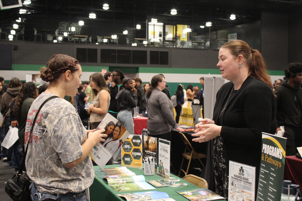student talking to representative at SMC