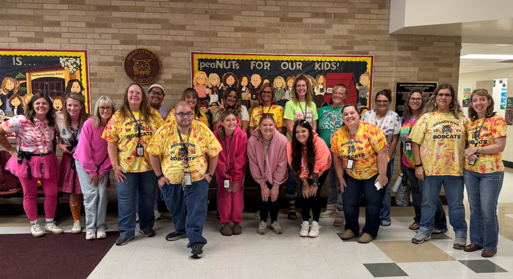 staff dressed in tie dyes