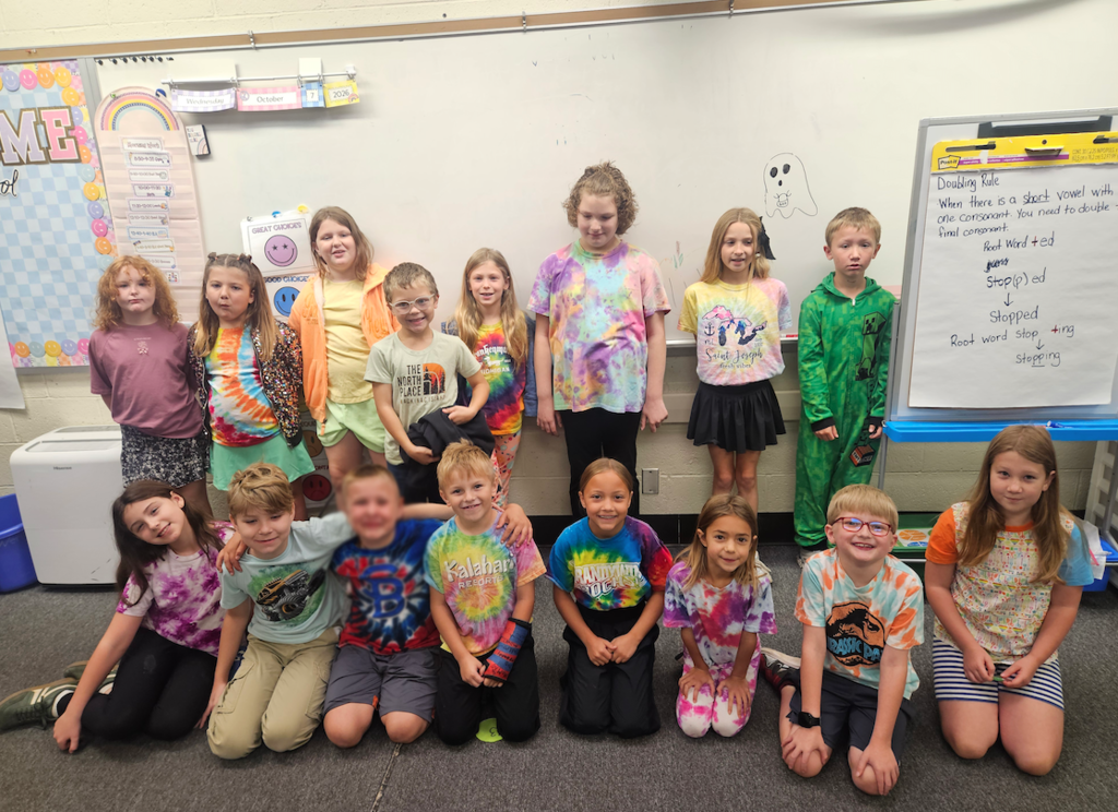 kids dressed in tie dye