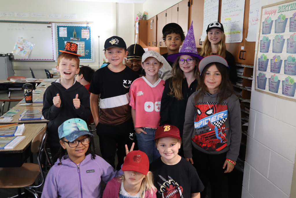 students with hats on