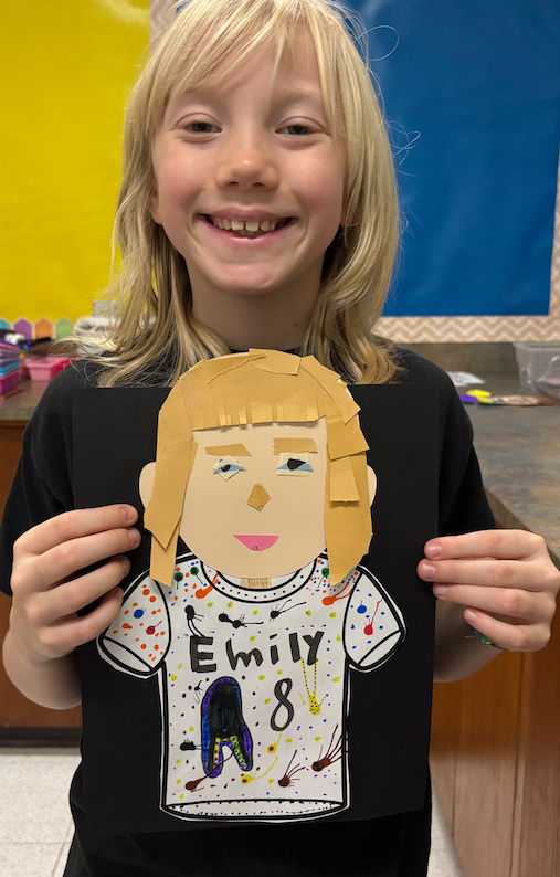 young girl with self portrait art project