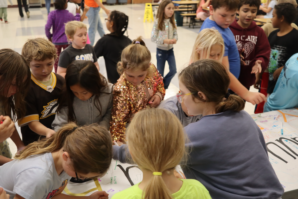 elementary kids signing banner