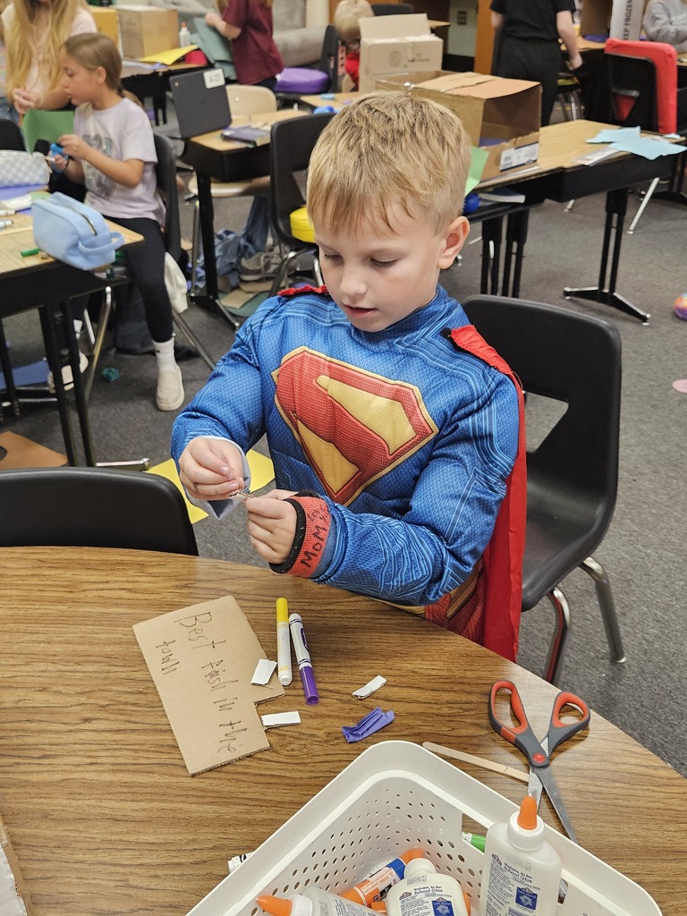 little boy working on a project