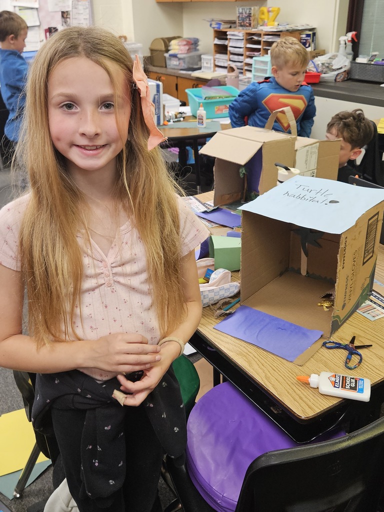 little girl working on a project