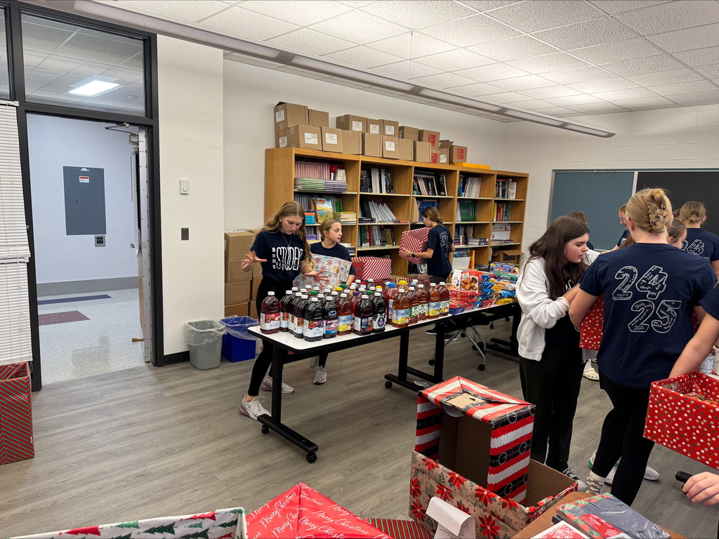 Students packing boxes