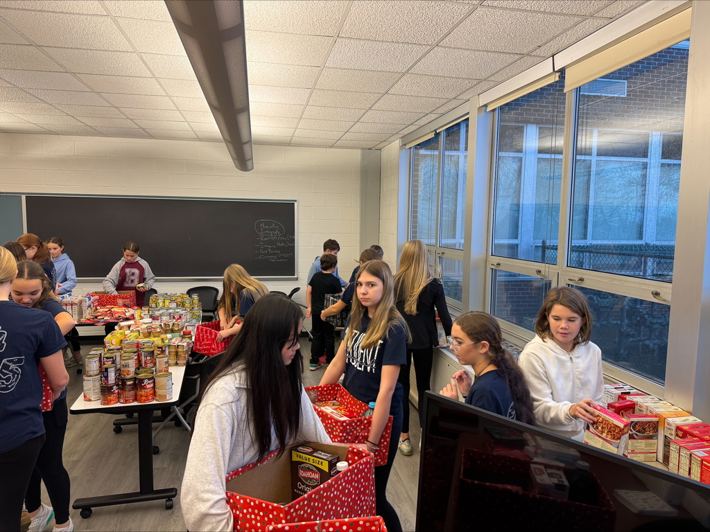 Students packing boxes