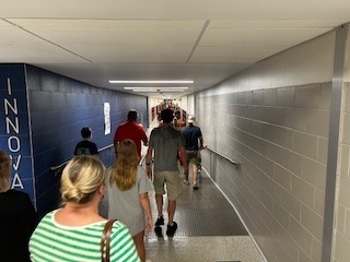 parents and students walking down the hallway