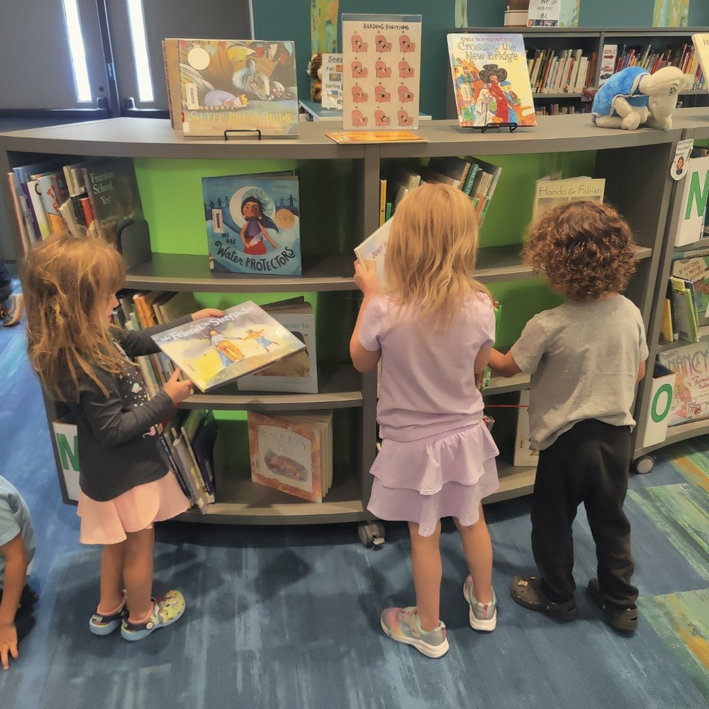 Students choosing books