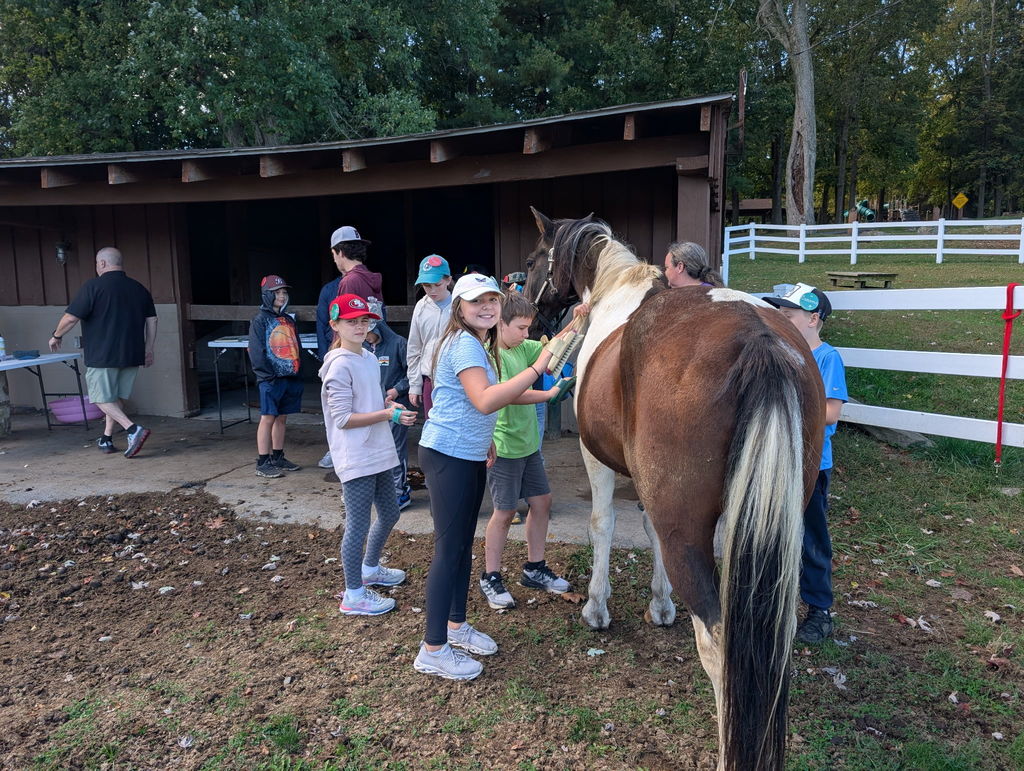 students with a horse