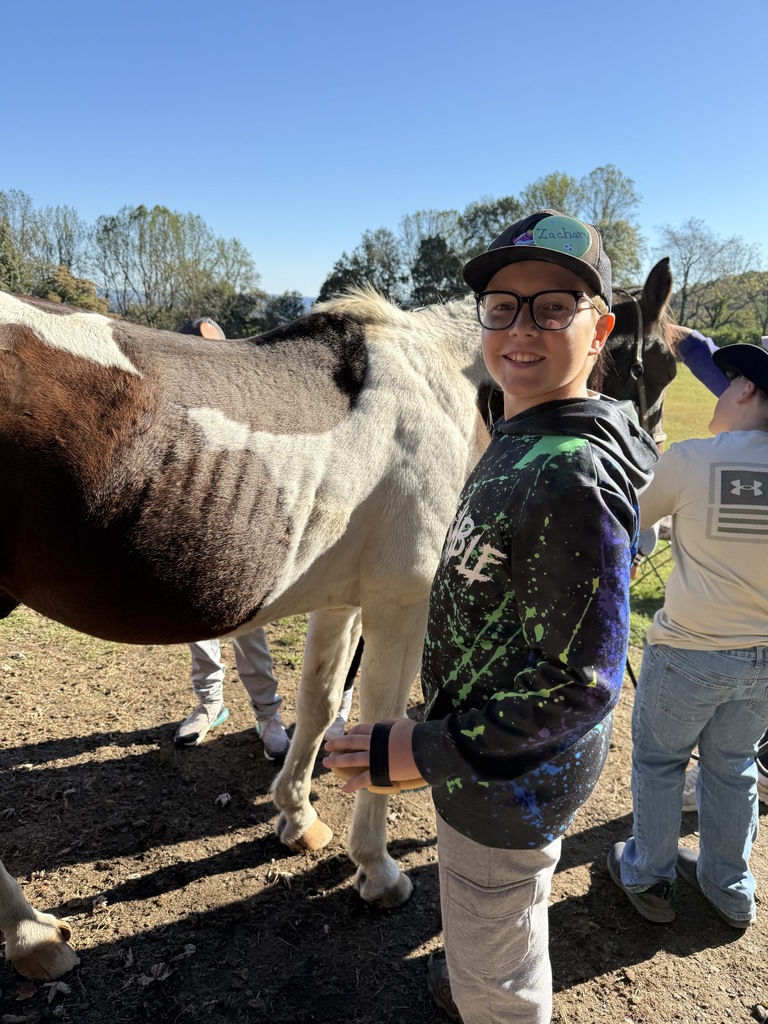 student with a horse