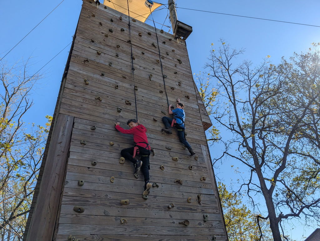 students on the climbing wall
