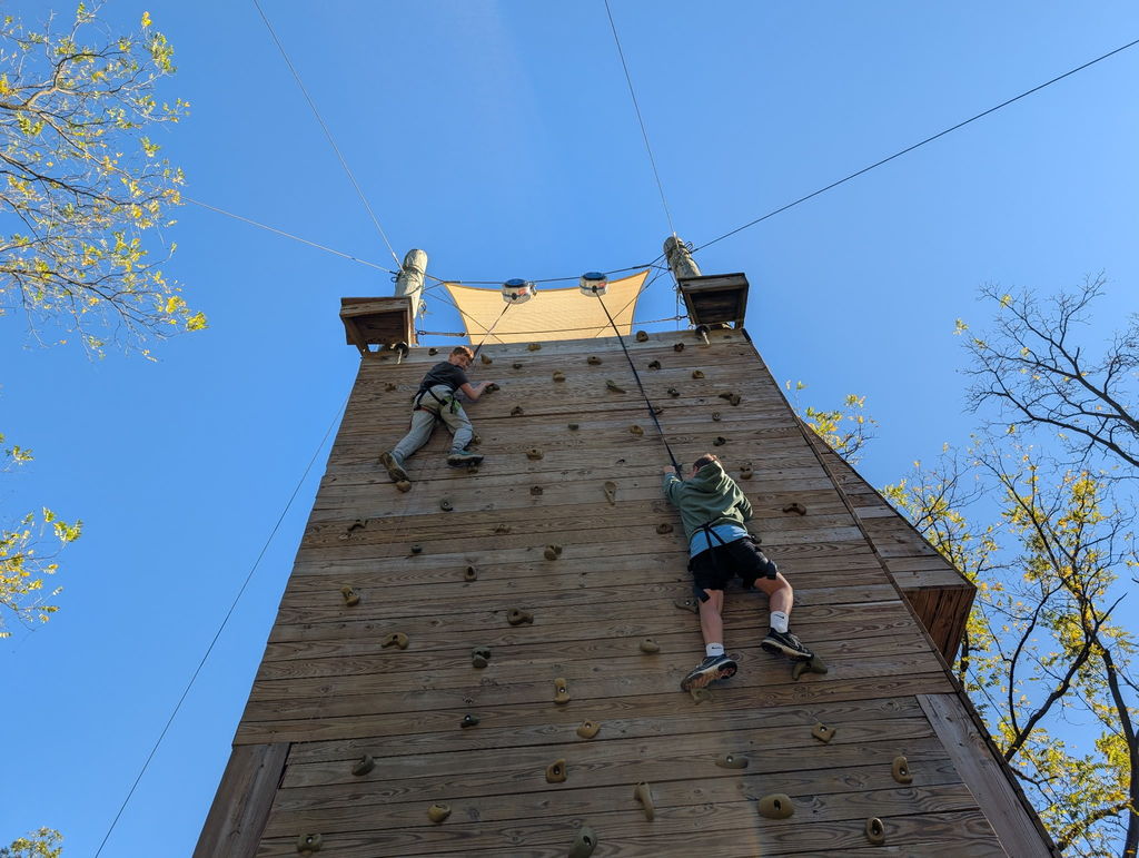 students on the climbing wall