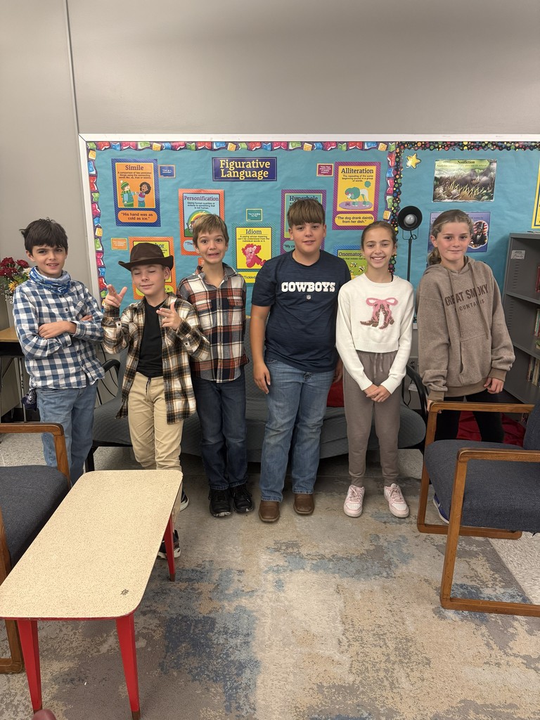 six students stand together in western clothes