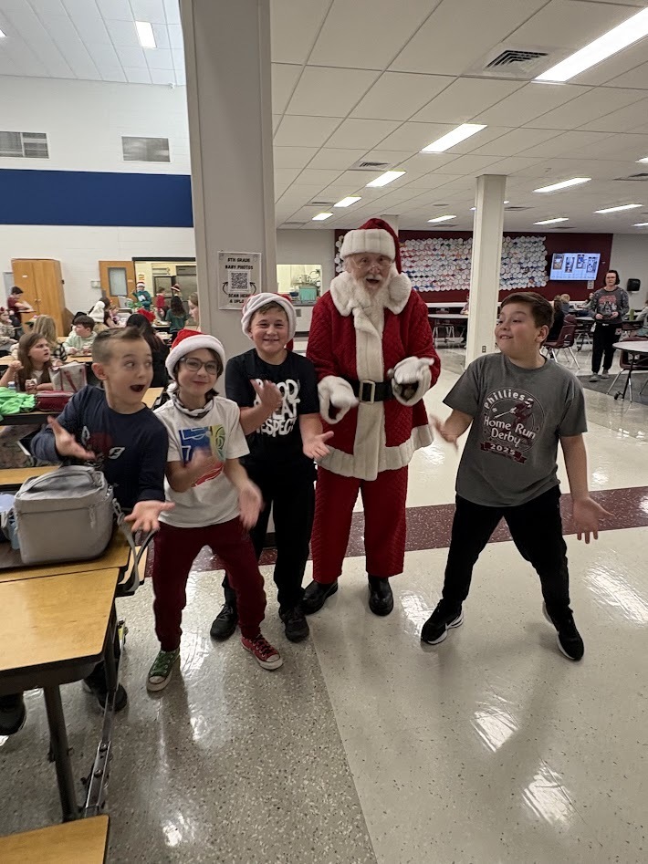 Santa's checked in, smiles around, the IS/MS students are ready to enjoy their holiday break!