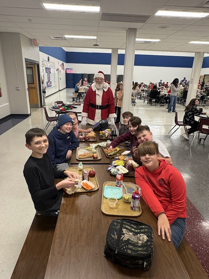 Santa's checked in, smiles around, the IS/MS students are ready to enjoy their holiday break!