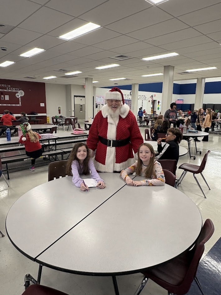 Santa's checked in, smiles around, the IS/MS students are ready to enjoy their holiday break!