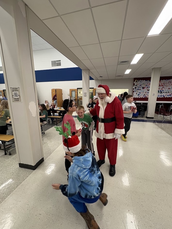 Santa's checked in, smiles around, the IS/MS students are ready to enjoy their holiday break!
