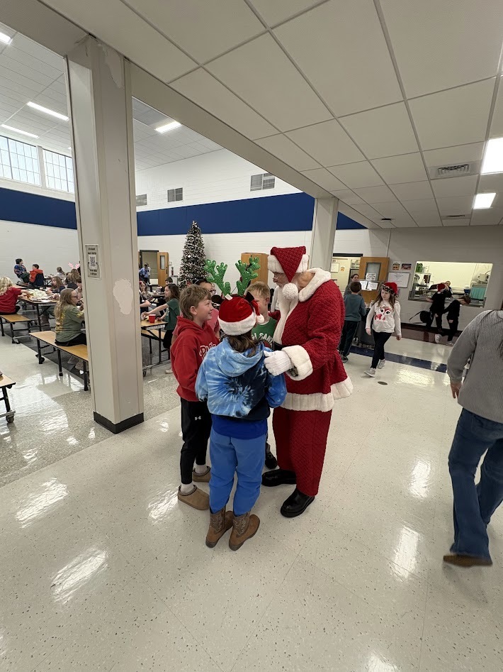 Santa's checked in, smiles around, the IS/MS students are ready to enjoy their holiday break!