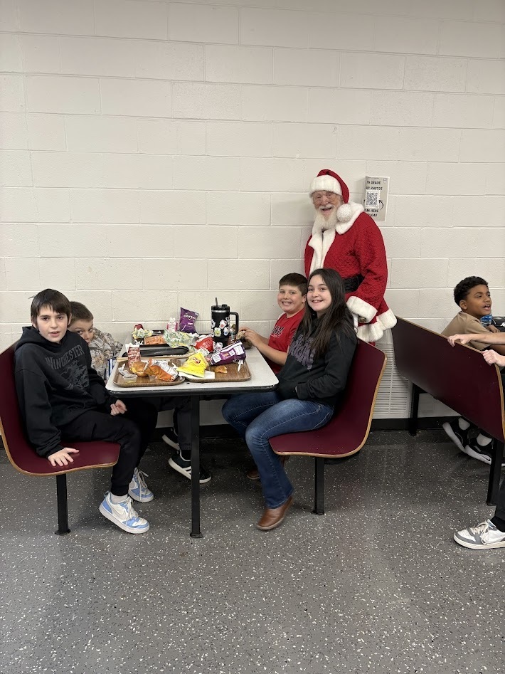 Santa's checked in, smiles around, the IS/MS students are ready to enjoy their holiday break!