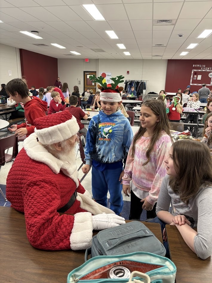 Santa's checked in, smiles around, the IS/MS students are ready to enjoy their holiday break!