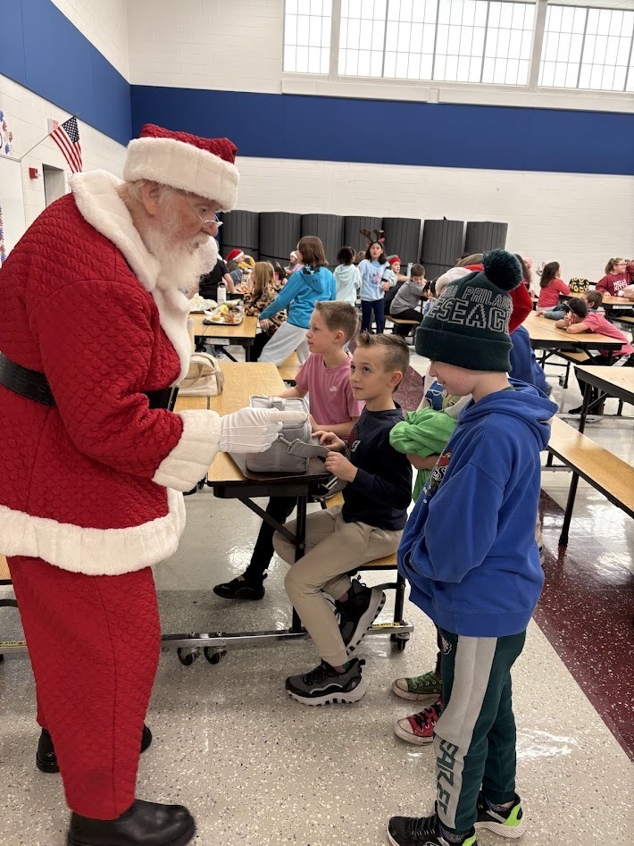 Santa's checked in, smiles around, the IS/MS students are ready to enjoy their holiday break!