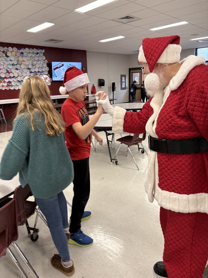 Santa's checked in, smiles around, the IS/MS students are ready to enjoy their holiday break!
