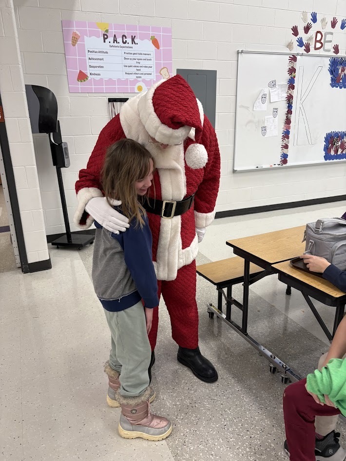 Santa's checked in, smiles around, the IS/MS students are ready to enjoy their holiday break!