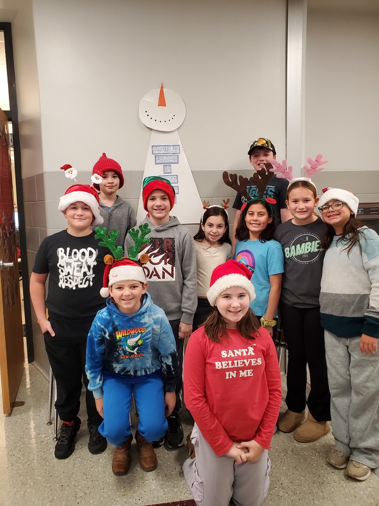 Santa's checked in, smiles around, the IS/MS students are ready to enjoy their holiday break!